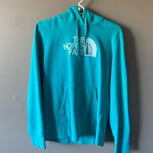 Teal North Face Hoodie size Medium. In perfect condition.